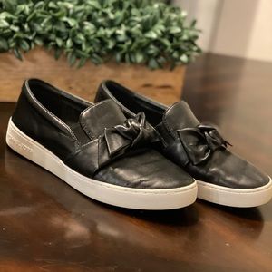 Michael Kors black slip on shoes